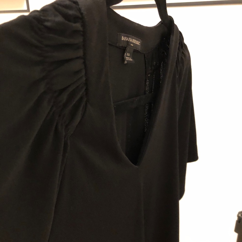 Black professional shirt with ruffle shoulder